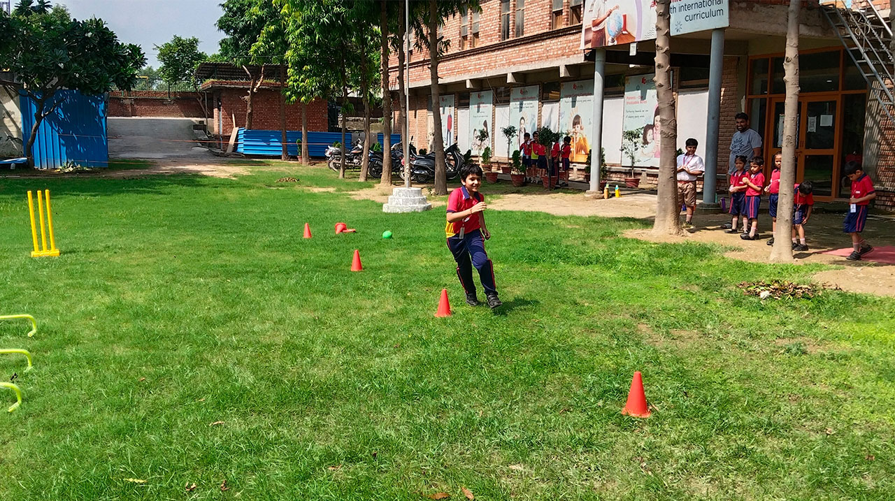 Inter-House Sports Competition 2025 at Radcliffe School, Greater Noida - Students participating in sports events like Tug of War, Lemon & Spoon Race, and Tiger Tail.